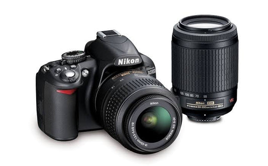 NIKON D3100 + 2 lenses 18-55mm & 55-200mm  DIGITAL SLR CAMERA ( used)
