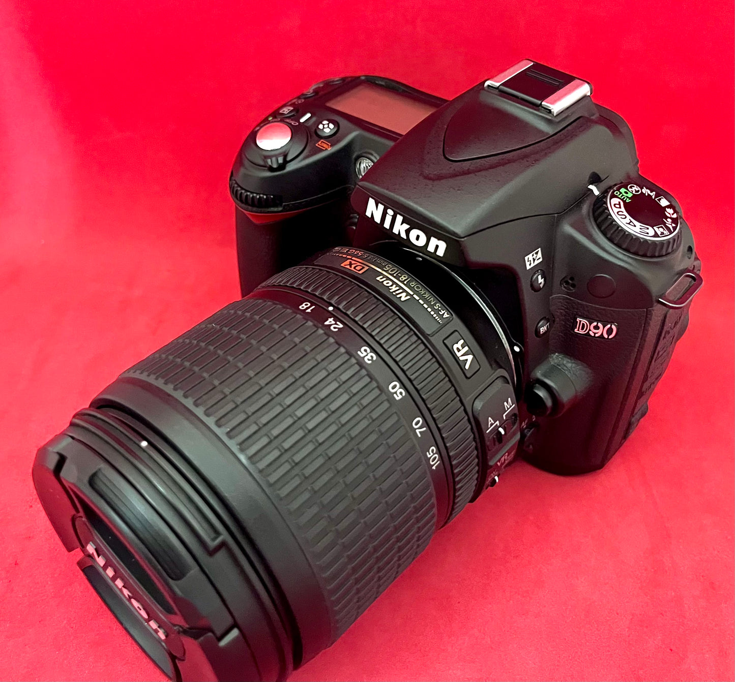 Nikon D90 with Lens 18-105mm (used)