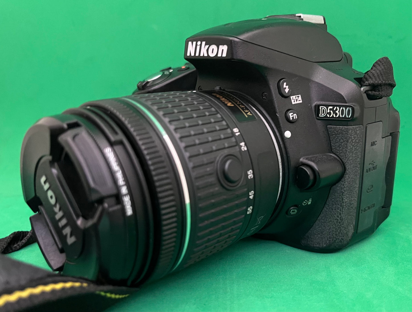 Nikon D5300 + 18-55mm lens (Used).