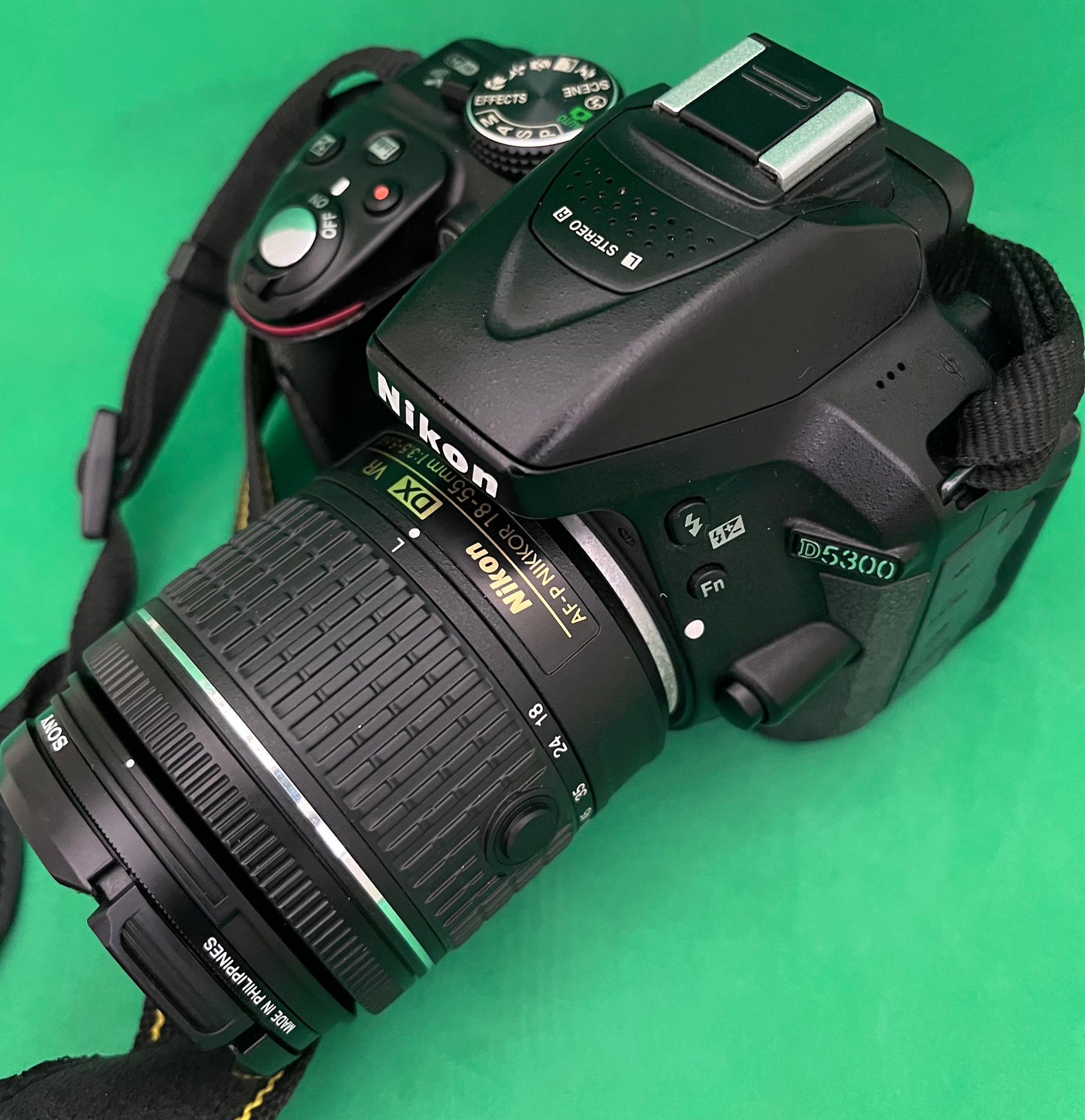 Nikon D5300 + 18-55mm lens (Used).