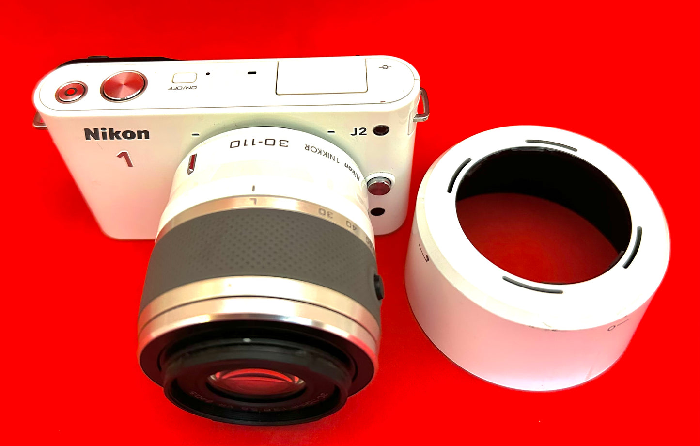 Nikon J2 White Body 30 110mm
White Telephoto Lens (used)
