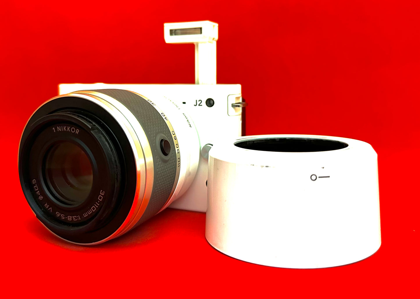 Nikon J2 White Body 30 110mm
White Telephoto Lens (used)