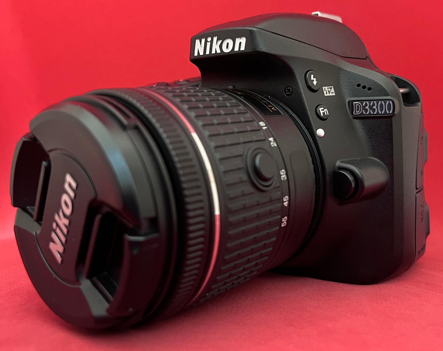 Nikon D3300 24.2 MP CMOS Digital SLR with Auto Focus-S DX Nikkor 18-55mm f/3.5-5.6G VR II Zoom Lens (used)