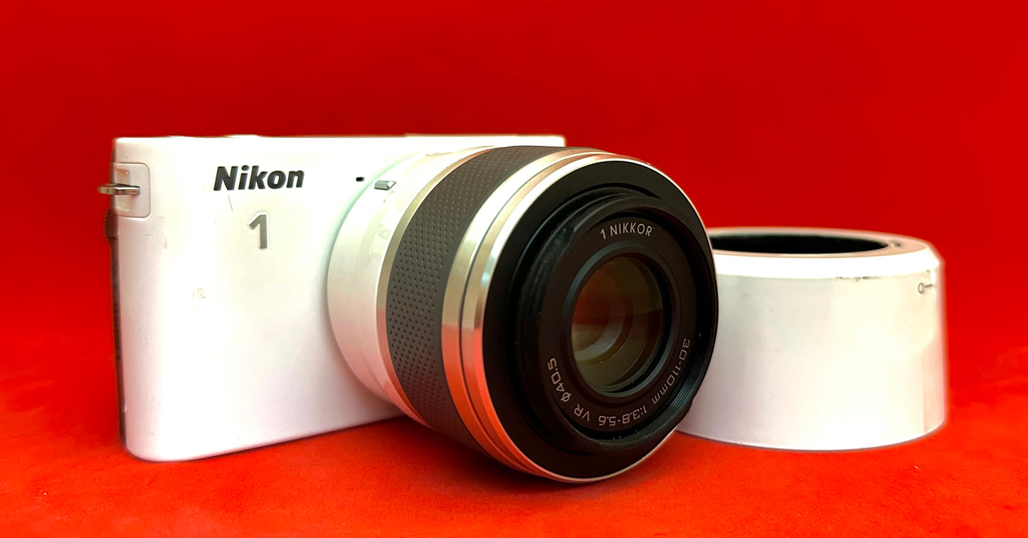 Nikon J2 White Body 30 110mm
White Telephoto Lens (used)